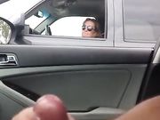 Guy jerks off and ejaculates in car while a mature woman looks