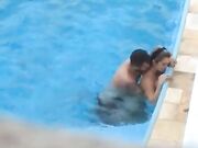 Lascivious couple makes sexual intercourse in public swimming pool while hidden voyeur records