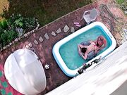 Security camera caught couple having sexual intercourse in the homemade swimming pool